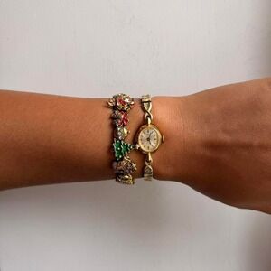 GOLD TONE CHRISTMAS THEMED CHARM BRACELET